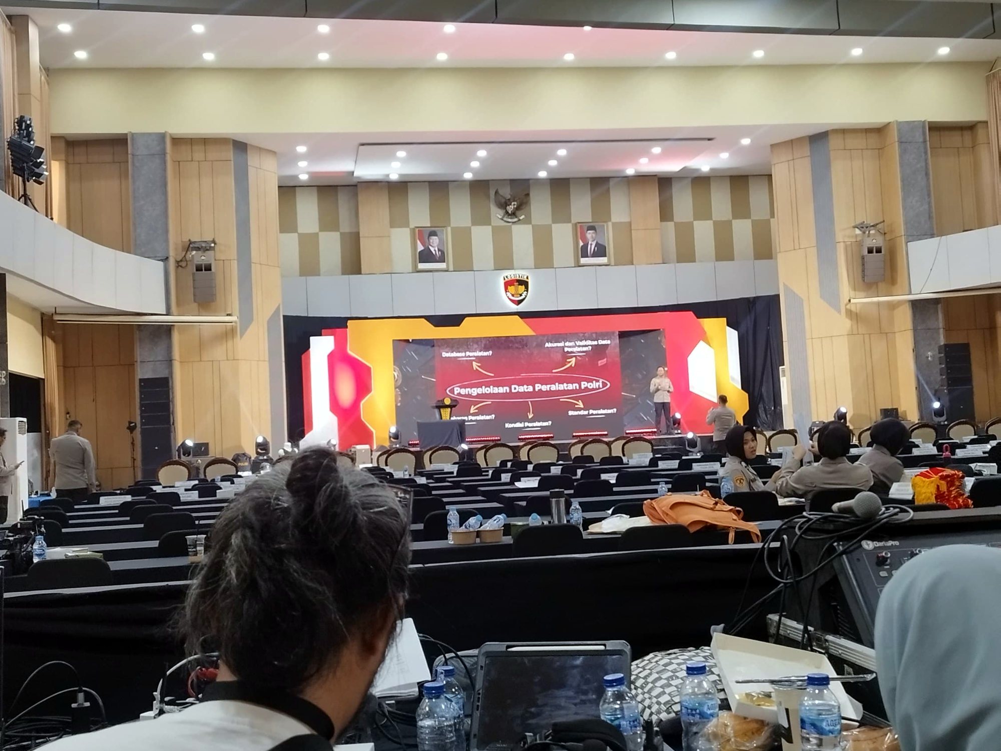 A full hall facing the stage at the POLRI application launch